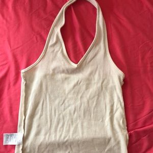 Tan crop top with no sleeves